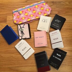 Bundle of 9 mix and match perfume samples with a brand new Clinique bag.